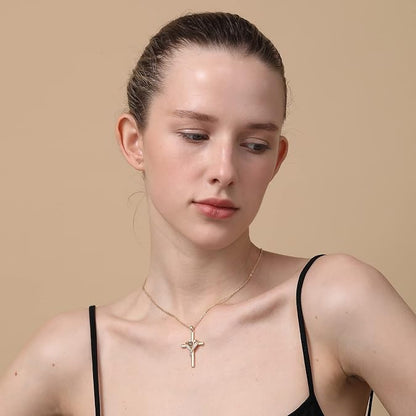 Model wearing the faith-inspired projection cross necklace